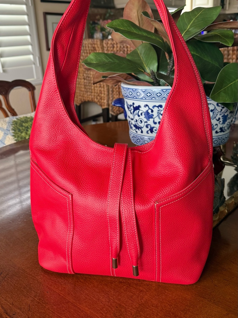LAGGO 
Classic Red Pebbled Leather Hobo Bag. Never used.